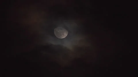 Moon behind clouds, 500% Stock Footage 24637114