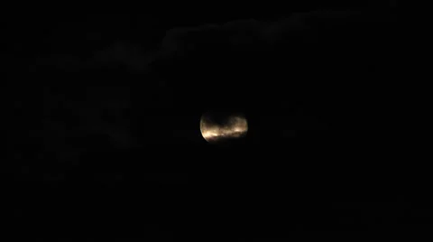 Moon behind clouds Stock Footage 37024532