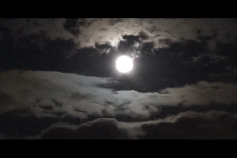 Moon behind clouds timelapse Video stock 26717548