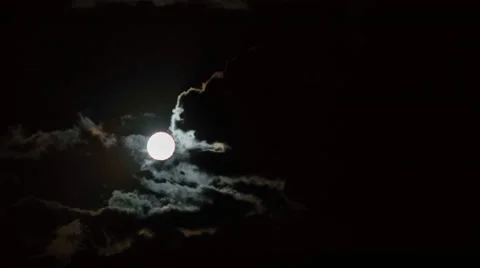 Moon behind moving clouds Stock Footage 26086558