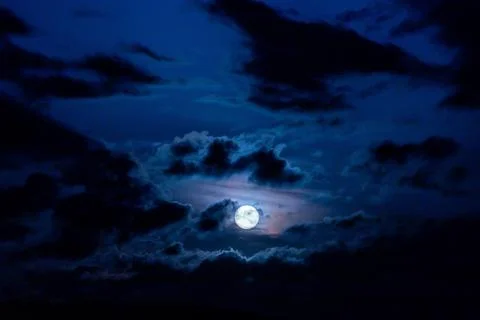 The Moon Between Night Clouds Stock Photos