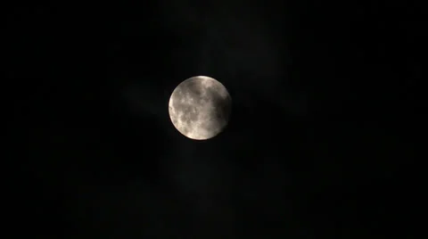 Moon on a black night sky and floating clouds 動画素材 39799193