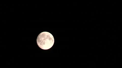 The moon on  black night sky and floating clouds Видео 40458187