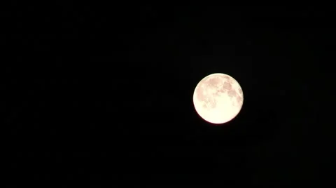 Moon on a black night sky and floating clouds Stock-Footage 40541293
