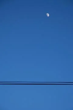 Moon in the blue sky Stock Photos
