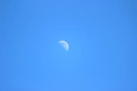 Moon on the blue sky Stock Photos