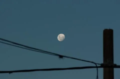 The moon in a blue sky Stock Photos