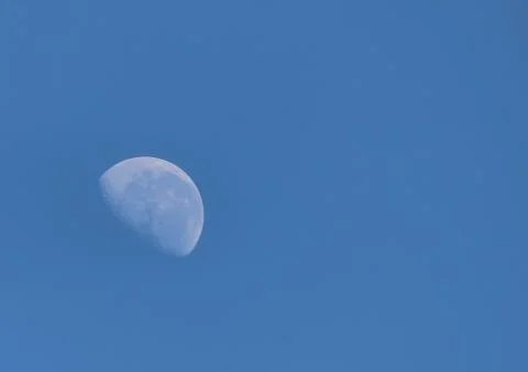 Moon in the blue sky Stock Photos