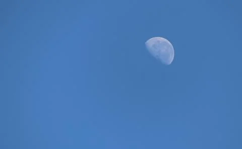 Moon in the blue sky Fotos de archivo
