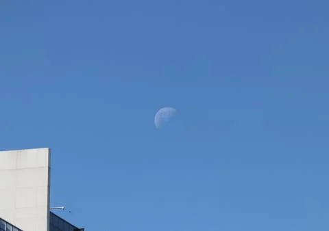 Moon in the blue sky Fotos de archivo