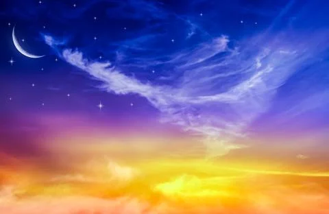 Moon in bright clouds of sunset sun . Stock Photos