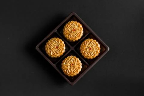 Moon cake on black background Stock Photos