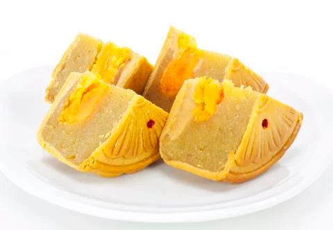 Moon cake on white plate Stock Photos
