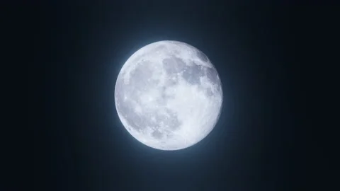 The Moon with a changing phase and detailed surface in the night sky Stock Footage 141754752