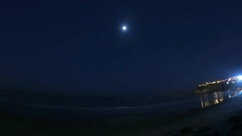 Moon chasing Jupiter Night time-lapse Video stock 150408761