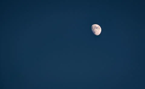 The Moon in a clear sky Stock Photos