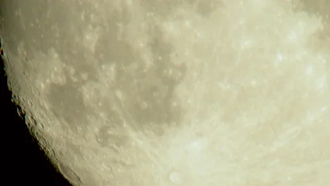 Moon close up craters terminator side large magnification air disturbance Stock Footage 136746385