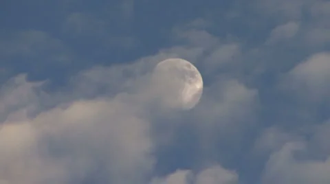 The Moon &amp; Clouds In Blue Sky Stock Footage 948261