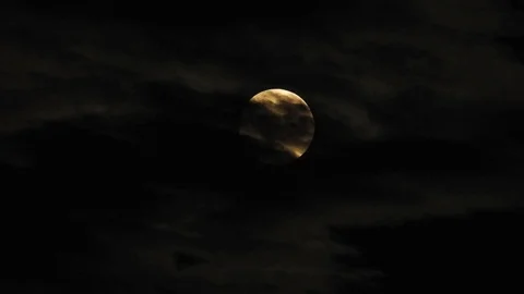 Moon with clouds moving on sky, 4k closeup video at night Video stock 99964749