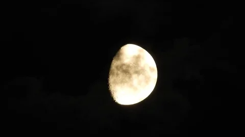 Moon with clouds moving on sky, 4k closeup video at night Stock Footage 99964761