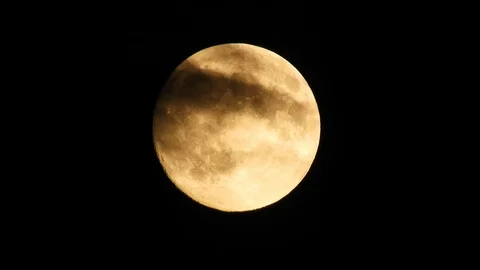Moon with clouds moving on sky, 4k closeup video at night Video stock 99964822