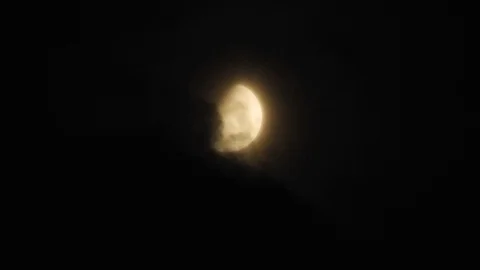 Moon with clouds moving on sky, 4k closeup video at night Video stock 99964928