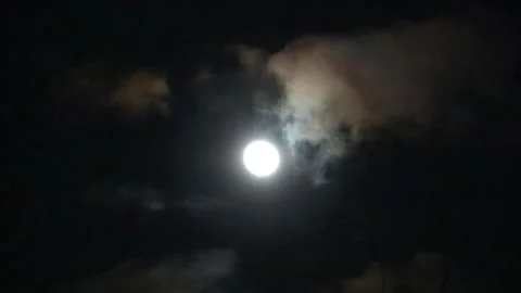 Moon in the clouds in the night sky Stock Footage 270510503