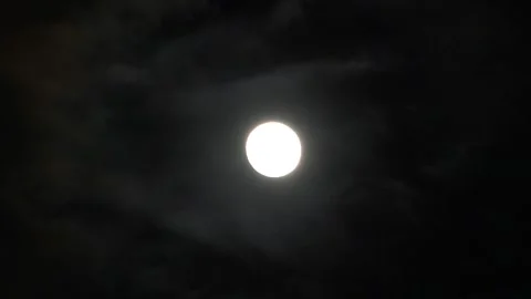 Moon in the clouds in the night sky Stock Footage 270510529