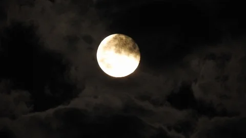 Moon with clouds in the night sky. Mysterious night sky with cloudy weather Stock Footage 116812294
