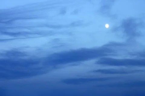 Moon in the clouds Stock Photos