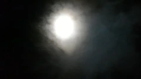 Moon in a cloudy night Stock Footage 12411217