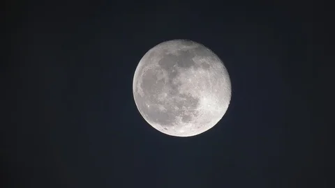 Moon on cloudy night seen from a 600mm refractor telescope at near Zenith Stock Footage 123196251