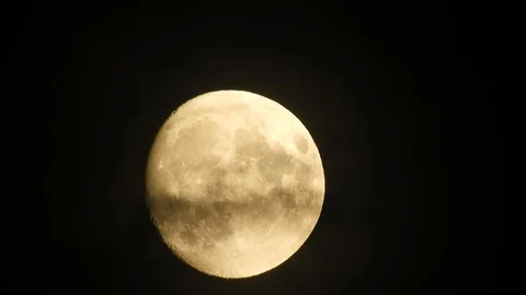 Moon in cloudy night sky. Close up  4k video Stock Footage 95441857