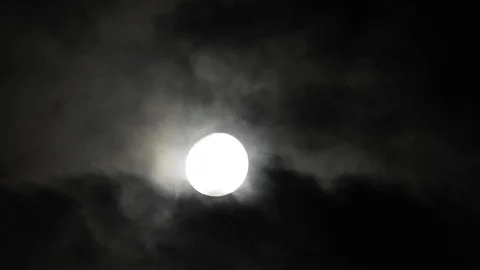 Moon in cloudy night sky. Close up  4k video Stock Footage 95441930