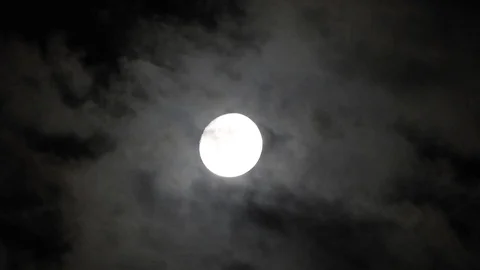 Moon in cloudy night sky. Close up  4k video Stock Footage 95441967
