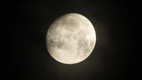 Moon in cloudy night sky. Close up  4k video Stock Footage 95442077