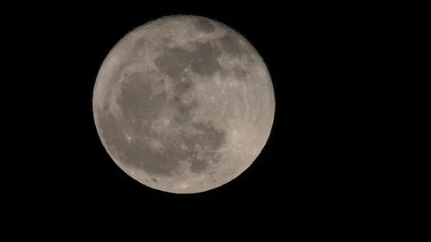 Moon in cloudy night sky close up video 스톡 동영상 108268749
