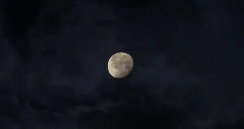 Moon with Dark Clouds Moving - 4k Stock Footage