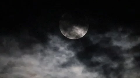 Moon with dark clouds rush past Stock Footage 289163831