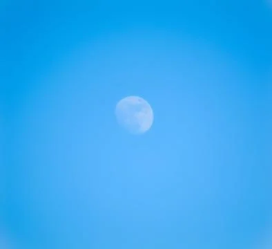 The moon in the daytime sky Stock Photos