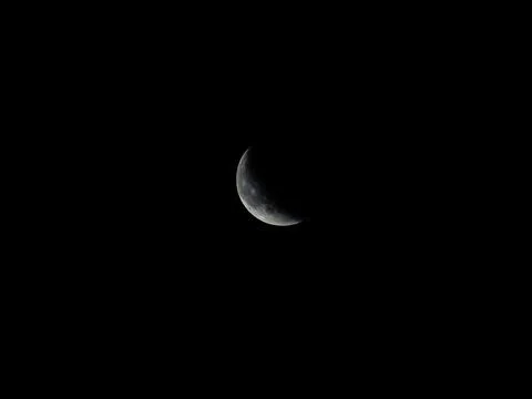 Moon diminishing half Stock Photos