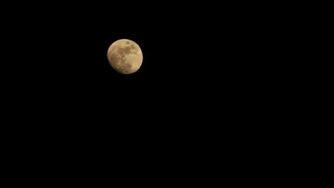 Moon Drifting Across Night Sky 4K - Part 3 Stock Footage 335956540