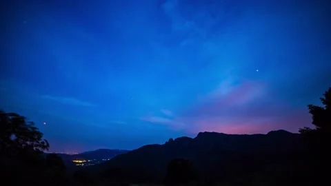 Moon eclipse and sunset in La Garrotxa, Girona, Spain 動画素材 136736639