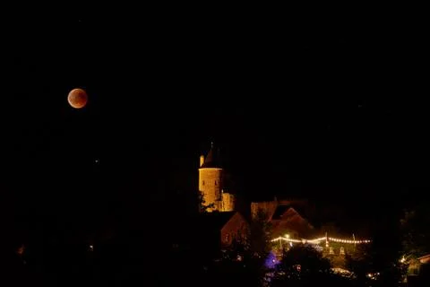 Moon eclipse with blood moon and mars in muerlenbach bertradaburg germany Stock Photos