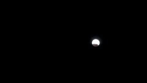 Moon Eclipse Ending and the Moonset Stock Footage 220814635
