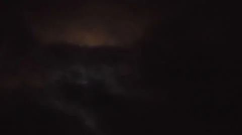 Moon emerges from clouds 2 Stock Footage 24637314