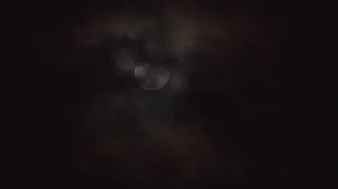 Moon emerges from clouds Stock Footage 24637374