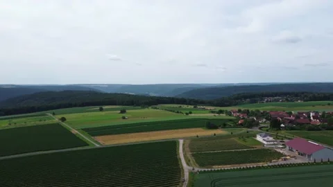 Moon, fields and pastures on a hill near the village Stock Footage 156472660