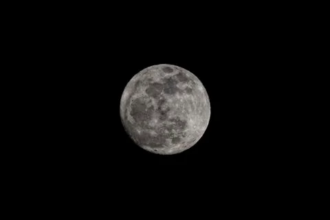 Moon full on black sky background Foto stock