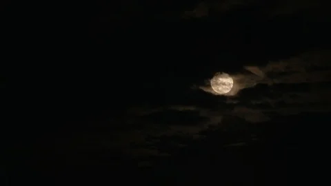Moon Full HDR High Dynamic Range with Clouds Rolling By Stock Footage 114771436